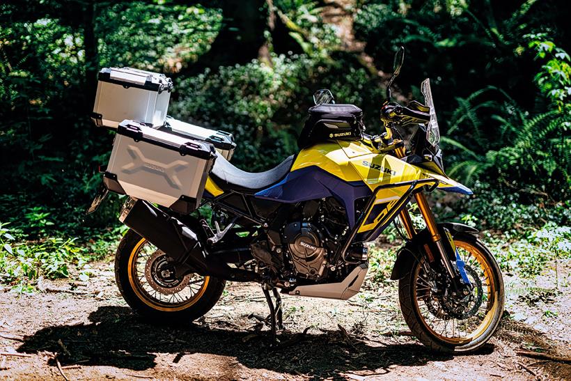 The hard luggage sits above a beefier subframe.