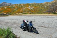 2023 Kawasaki K L R 650 Adventure riding on rough paved mountain road