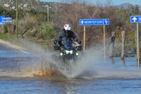 2023 Kawasaki K L R 650 Adventure riding through shallow water crossing